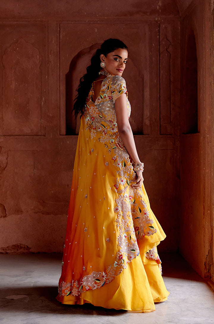 SIGNATURE CROSS DRAPE LEHENGA  SET WITH HEAVY EMBROIDERED BLOUSE & DOUBLE LAYERED SKIRT